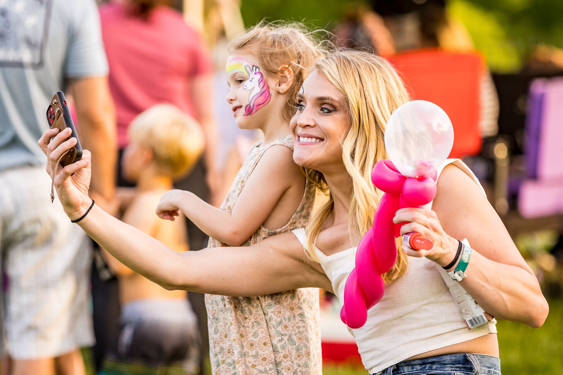 mother and daughter wearing face paint at memorial day picnic at big cedar lodge